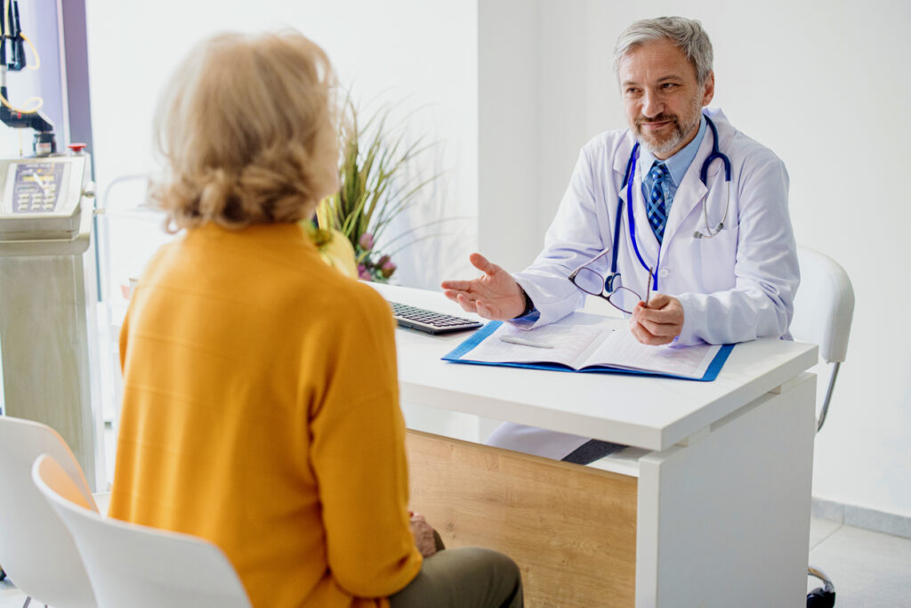 Doctor explaining  hormone replacement therapy to his patient