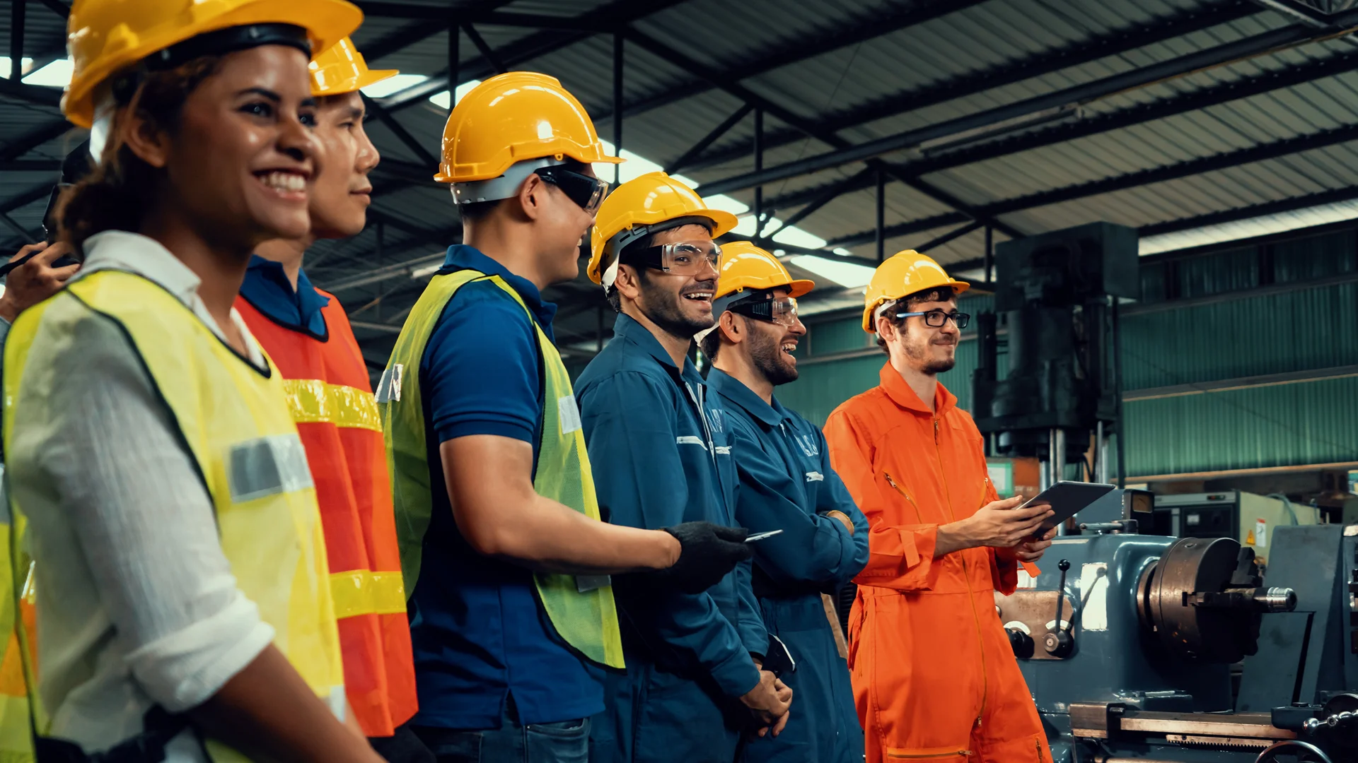 Workers in coveralls and hard hats