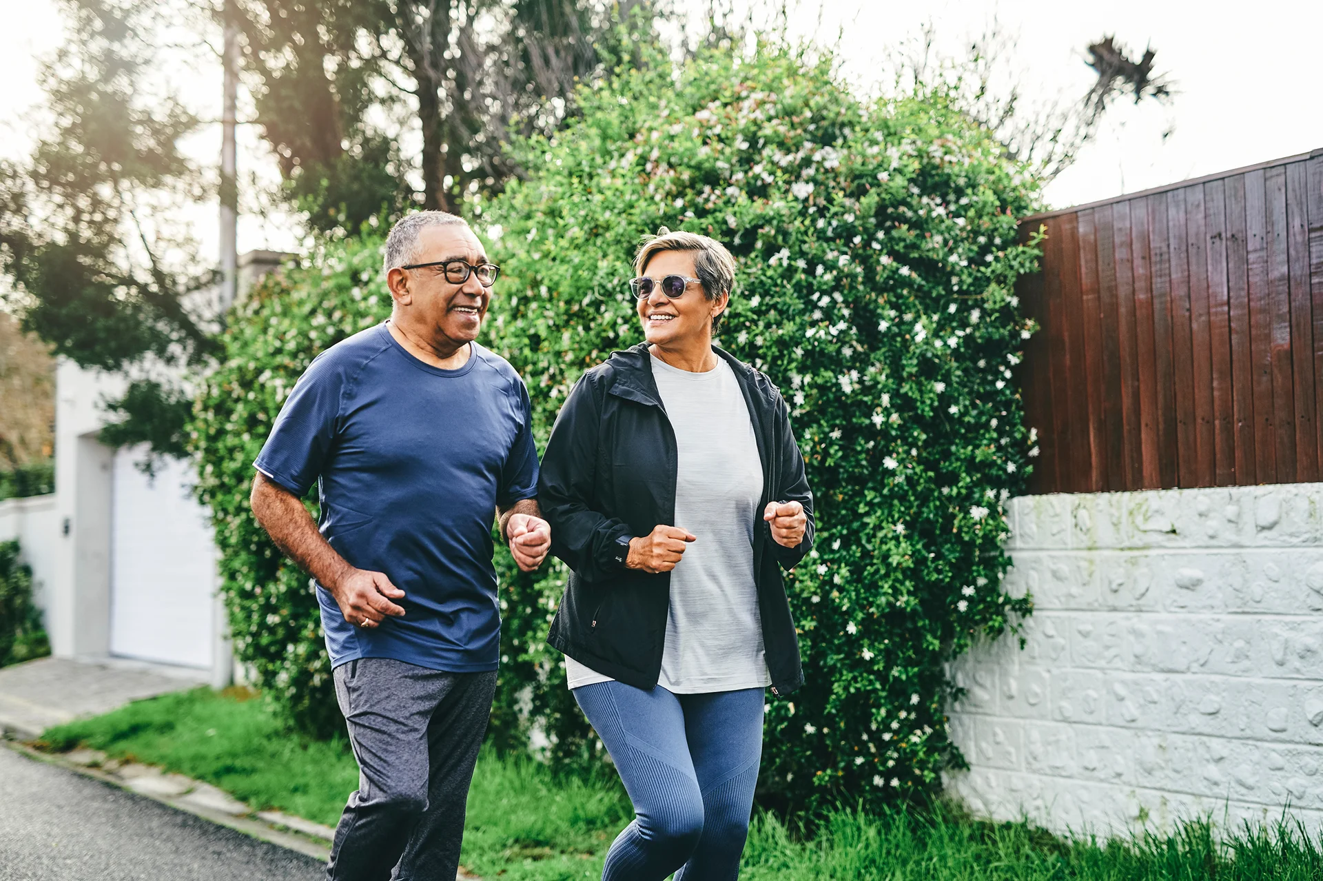 Jogging seniors man and woman.